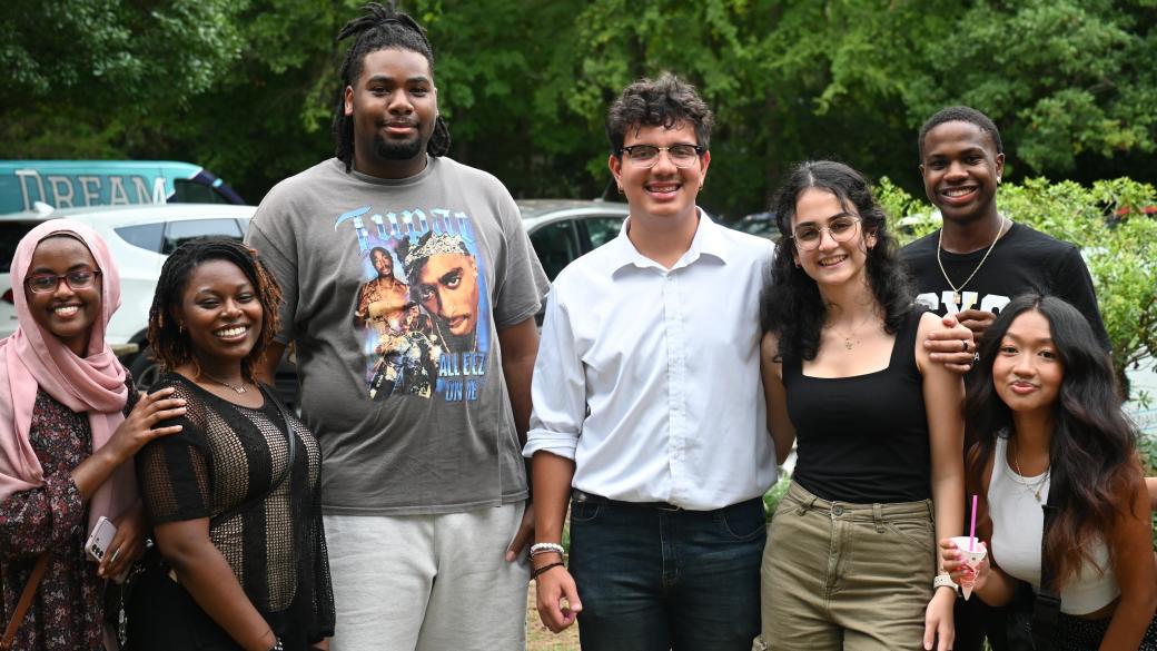 students smiling outside