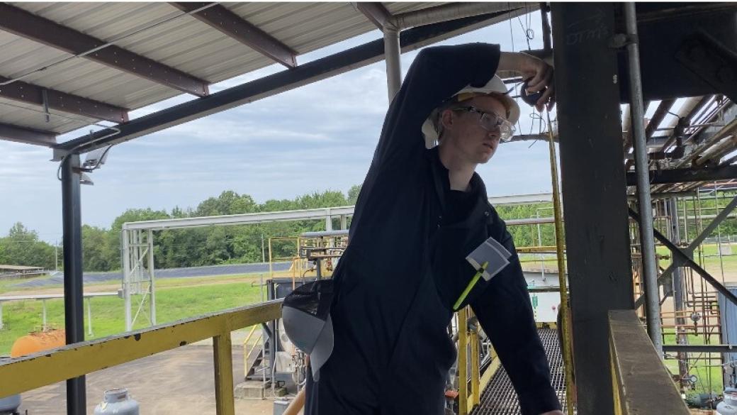 Intern working at a plant
