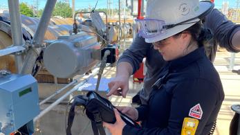 Intern working at a plant