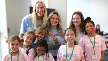 Albemarle employees smiling with students
