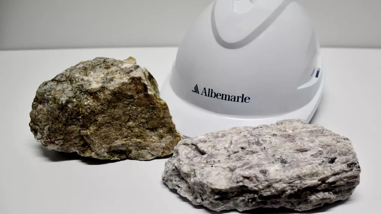 Image of white Albemarle hard hat with lithium deposits.