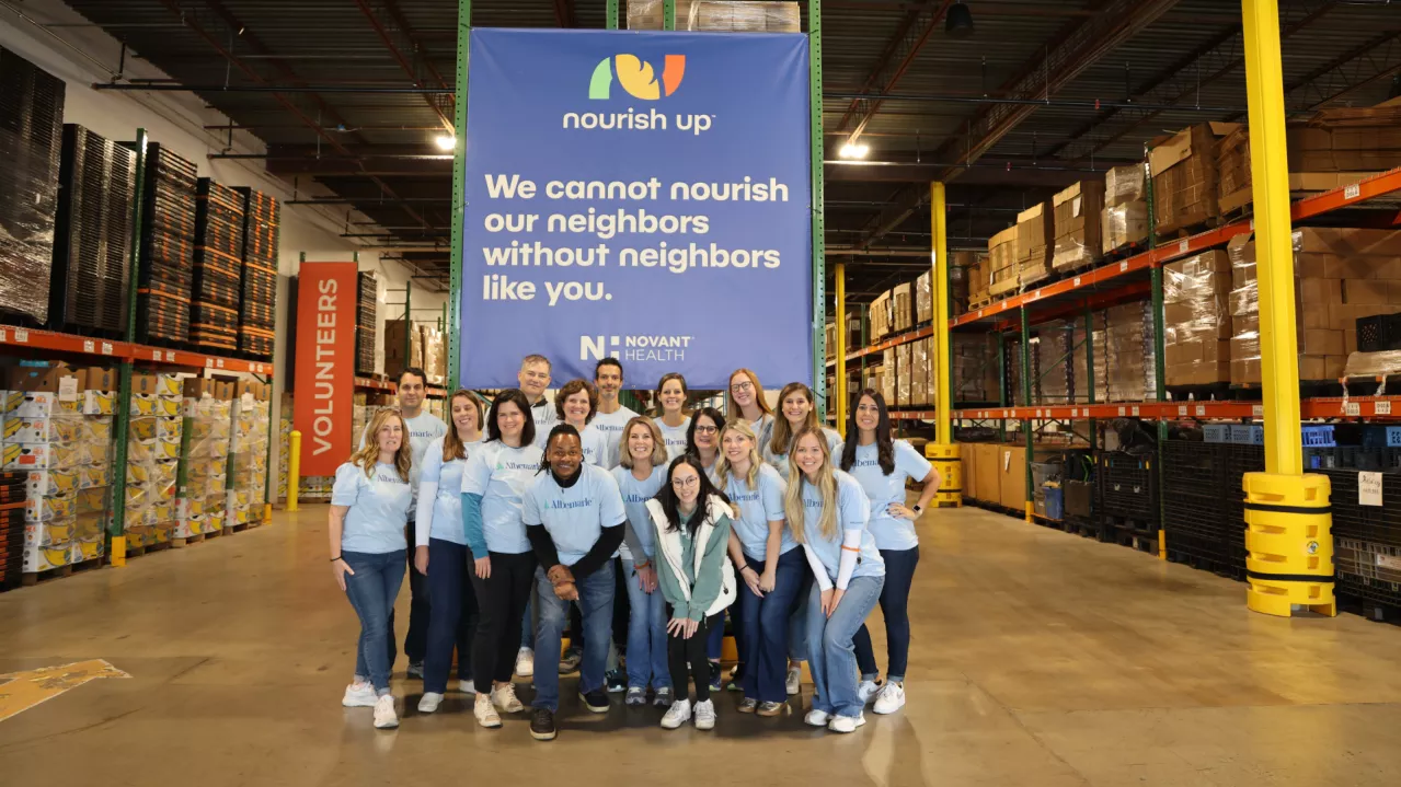 A photo of Albemarle employees volunteering at a Nourish Up event
