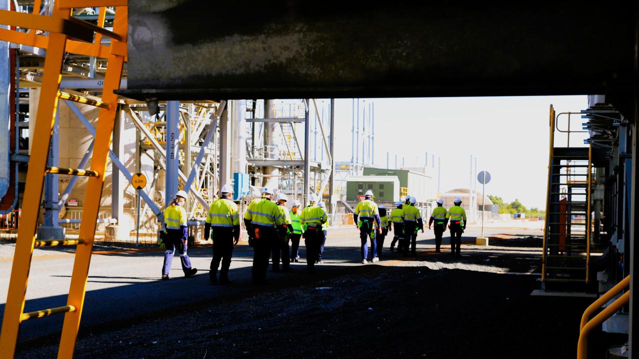 A group of people at a plant in Australia