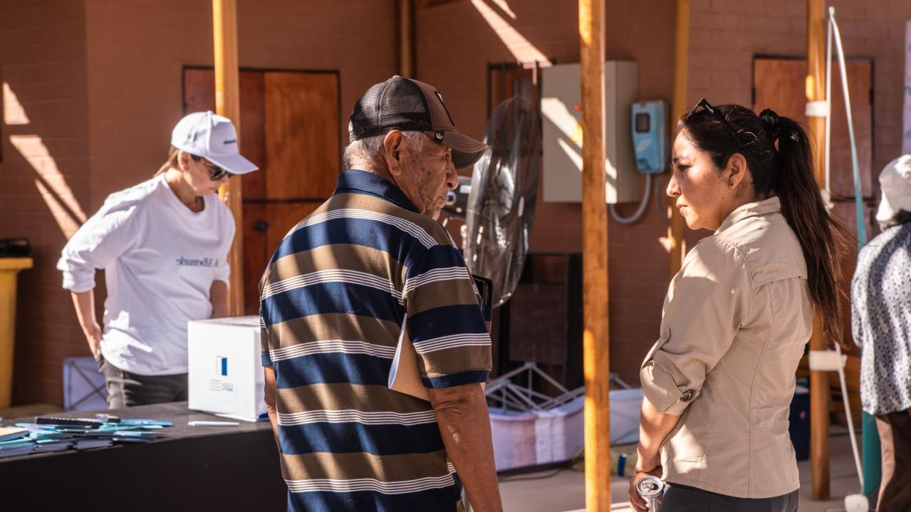 A photo of Albemarle employees meeting with the community in Chile