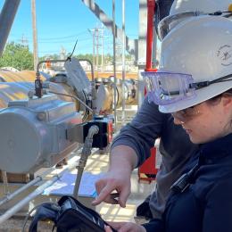 Intern working at a plant
