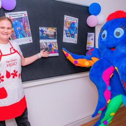 Albemarle volunteer helping at the Book Challenge