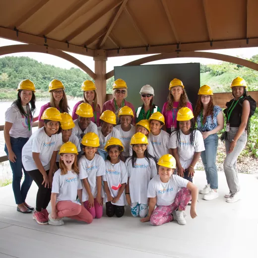 Group of children participating in Project Scientist. Project Scientist provides hands-on immersive summer and after-school programs focusing on science, technology, engineering, arts and math (STEAM) to girls ages 4-18 from marginalized and underserved communities.