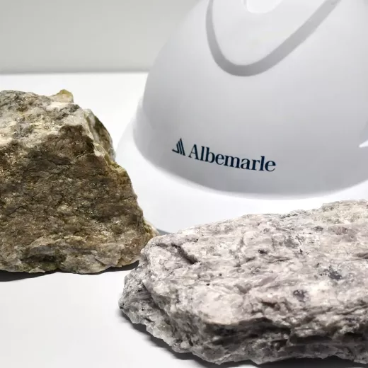 Image of white Albemarle hard hat with lithium deposits.