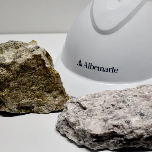 Image of white Albemarle hard hat with lithium deposits.