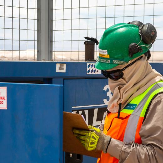 A photo of an Albemarle employee managing the digital infrastructure in Chile.