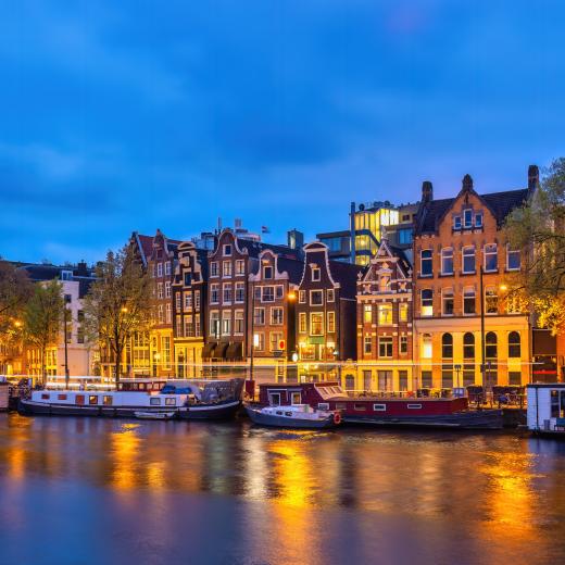 A photo of Amsterdam row houses on a canal