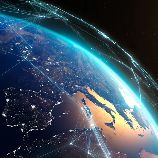 A digital graphic showing connections between various points over earth, highlighted by glowing lines and nodes against a part of the globe illustrating Europe and North Africa from space.