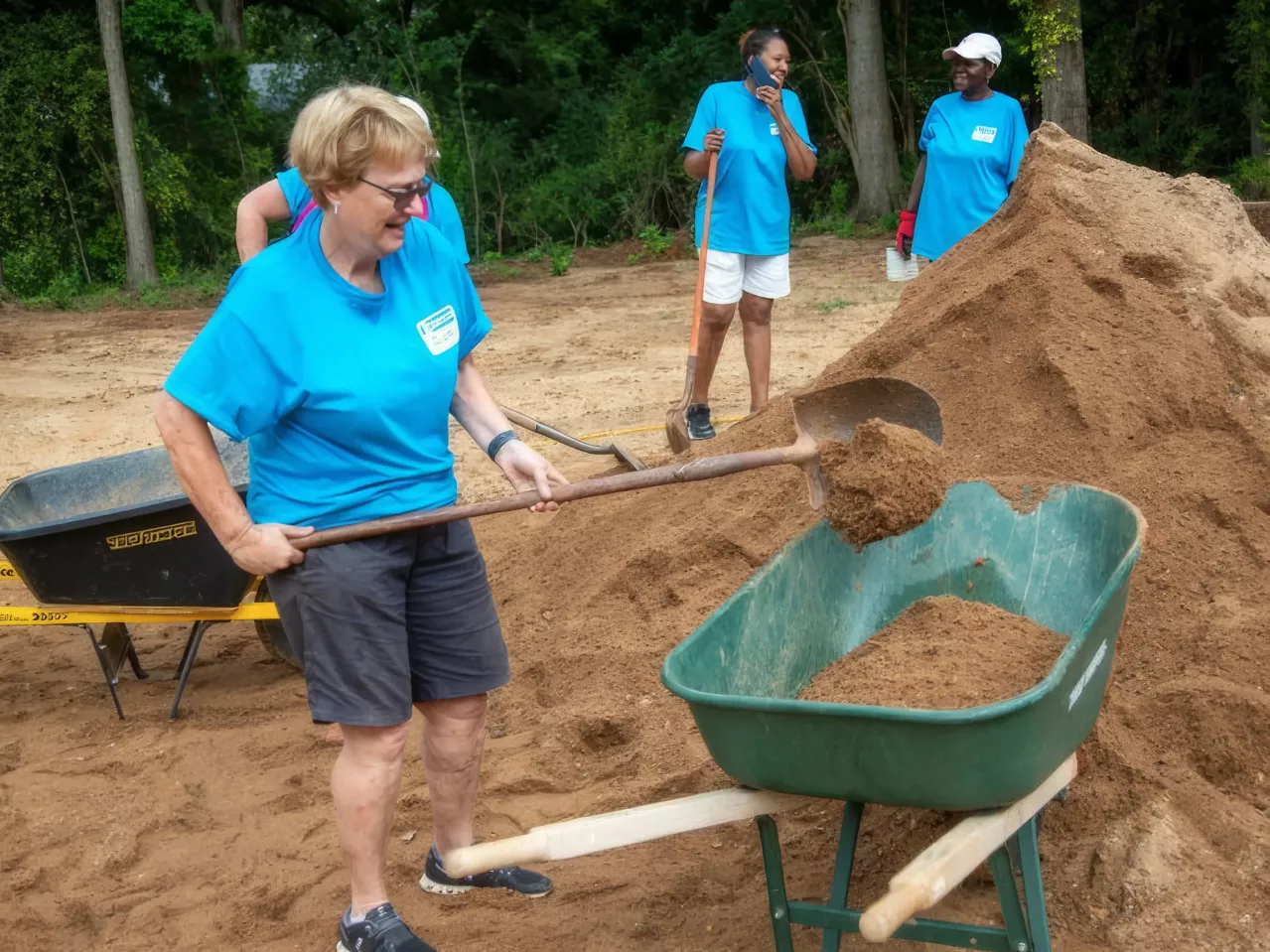 Employee with wheelbarrow.