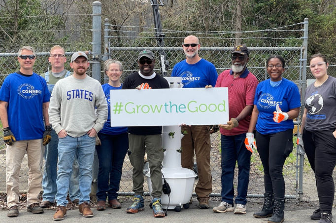 Albemarle employees volunteer to turn a portion of a Charlotte playground to become a sustainable garden.