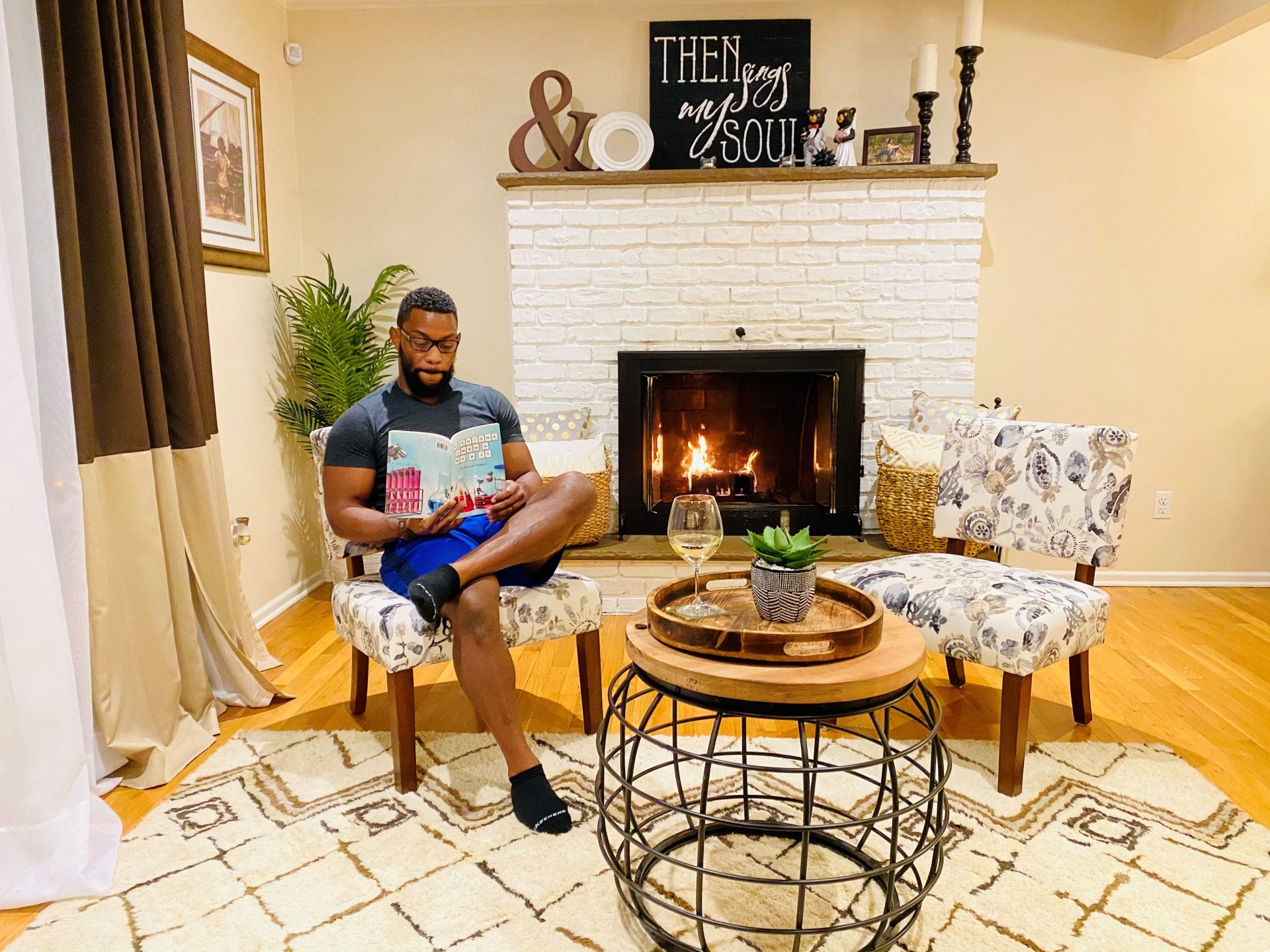 Dr. Donovan Thompson Reading in His Home